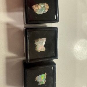 SOLD Lot of 4 Ethopian Opal Gemstones. Rough in box for display or jewelry